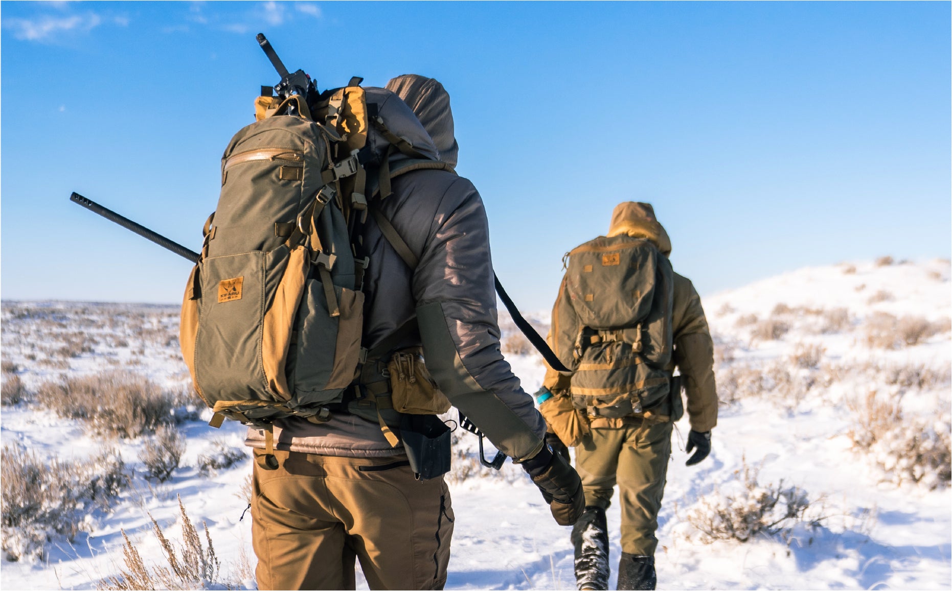 Two man hiking in a snow mountain